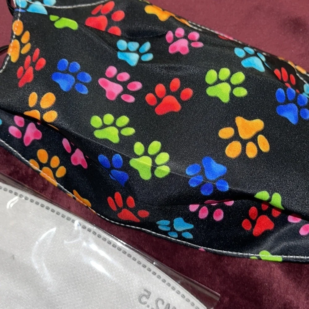 New multi color paw print face mask